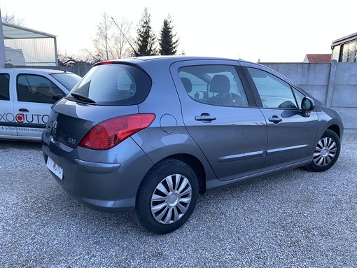 Peugeot 308 1.6 HDI 90 Ch 2009 - vue 2
