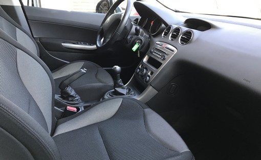 Peugeot 308 1.6 HDI 92 Ch active 2011 - vue 4