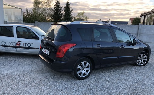 Peugeot 308 SW 1.6 HDI 92 2013 - vue 2